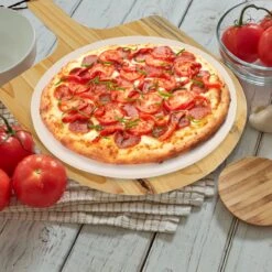 MaxxHome Pizzasteen - BBQ Steen - Maximum Te Verhitten Tot 600 Graden - ⌀33 - Incl. Houten Schep 10 MaxxHome Pizzasteen - BBQ Steen - Maximum Te Verhitten Tot 600 Graden - ⌀33 - Incl. Houten Schep -Barbecue Serie Winkel 1200x1200 532